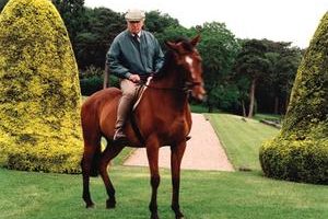 A man of many talents: Sir Stanley indulges his passion for horses