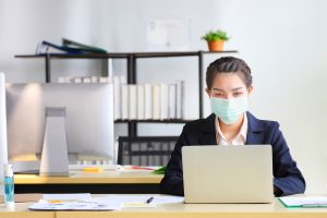 Office worker in mask