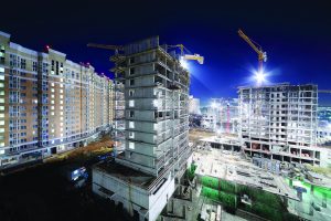 Blocks-of-flats-under-construction-night-Pavel-L-Photo-and-Video-shutterstock_150099908-300x200.jpg