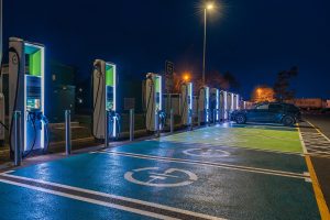 Electric-car-charging-night-300x200.jpg