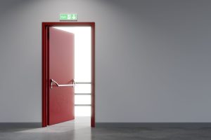 Fire exit - credit: Shutterstock / Suwatchai Pluemruetai