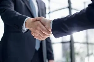 A picture showing two businessmen shaking hands