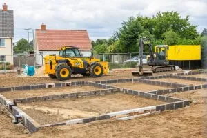 Small-housebuilding-site-shutterstock_2031338084-Simon-Collins-300x200.webp