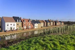 New-houses-by-canal-shutterstock_128408354-Paul-D-Smith-300x200.webp