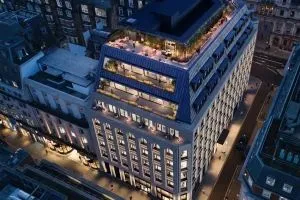 Aerial night time shot of 30 Duke Street in London St James's, owned by GPE