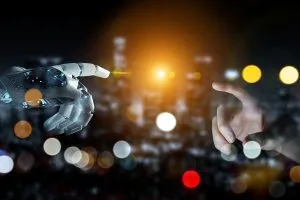 Robot-human-hand-AI-concept-shutterstock_1359911804-sdecoret-300x200.webp