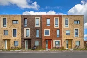 Modern-terraced-houses-coloured-brick-shutterstock_Rudmer-Zwerver-300x200.webp