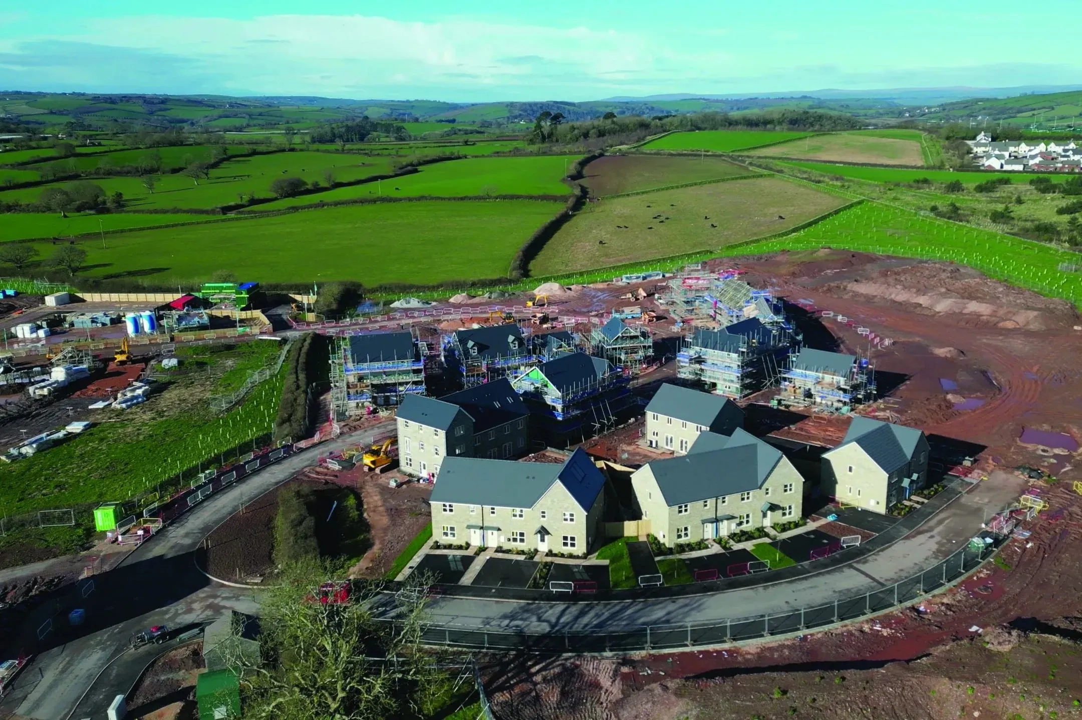 Paignton, South Devon, England: DRONE VIEWS: A new build house development under construction on green belt land at White Rock. Paignton is a popular UK holiday resort