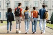 Students-walking-on-campus-shutterstock_2347683935-Prostock-studio-185x123.webp